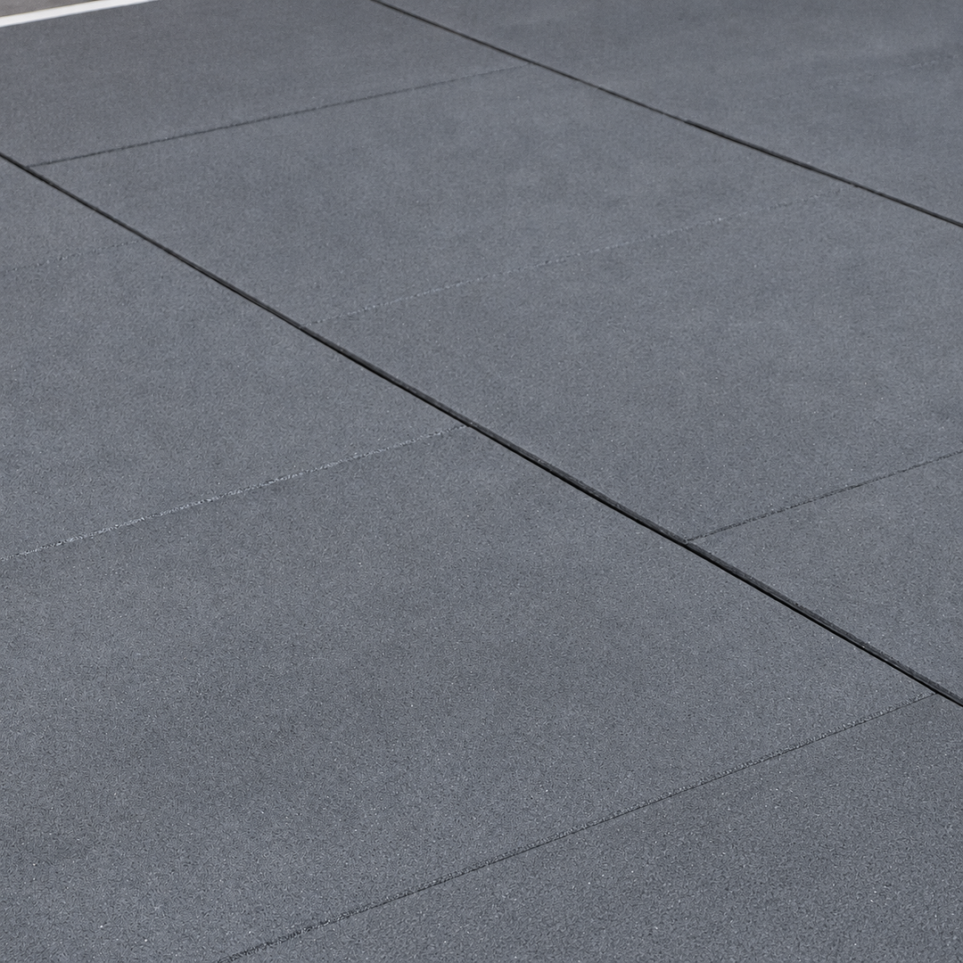 Gray rubber tile (from 1 to 4 cm thick)
